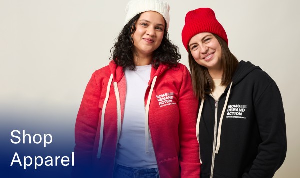 A photo of two models wearing Everytown and Moms Demand Action apparel that reads 