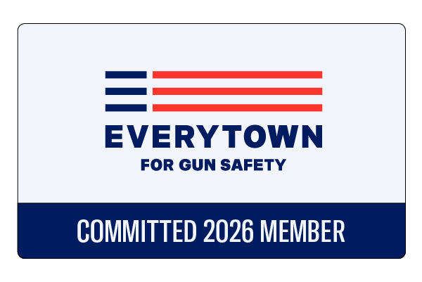 image of a membership card with the Everytown logo and a section of the card that says "committed 2026 Member" on a navy blue background against an all grey background.